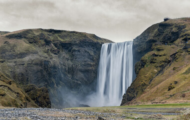 Skogafoss Waterfall In Iceland. Long Exposure. Blurry Water.