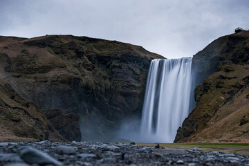 Obraz premium Skogafoss Waterfall In Iceland. Long Exposure. Blurry Water.