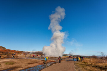 Fototapeta na wymiar Strokkur Geysir. One of Most Popular Place in Iceland. Water Spray.