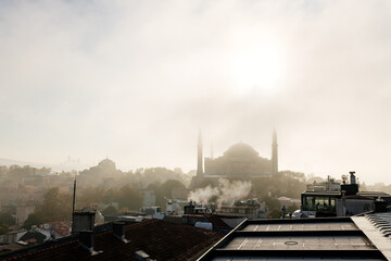 Beautiful view from the roof of the city in the clouds on a sunny day. Istanbul from a bird's eye...