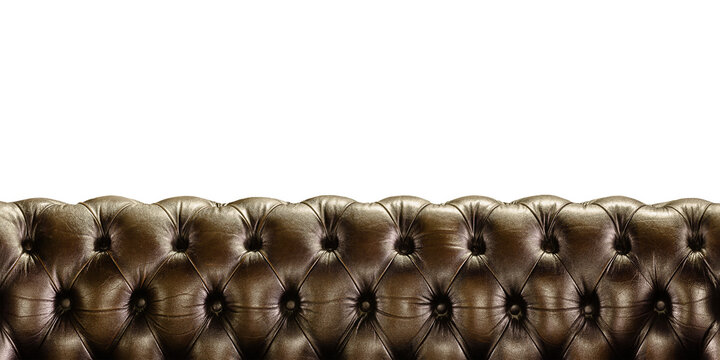 Back of a vintage weathered chesterfield brown sofa