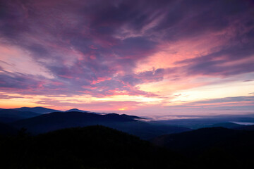 Sunrise in the Great Northwest. Purple skies over mountains at Olympic National Park, Washington, USA.