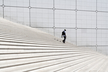 Man walking down stairs