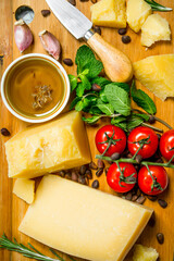 Parmesan cheese with tomatoes, pine nuts and olive oil.
