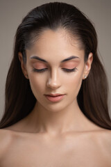 Naklejka premium Beauty portrait of a girl with pink shadows on her eyes.