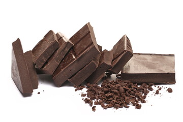 Chopped, milled dark chocolate pile with shavings isolated on white, side view