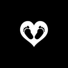 Baby\'s first steps icon isolated on black background.