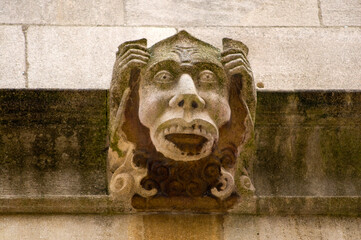 A surprised looking gargoyle on an Oxford College UK