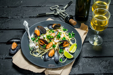 Mediterranean food. Seafood spaghetti with clams and white wine.