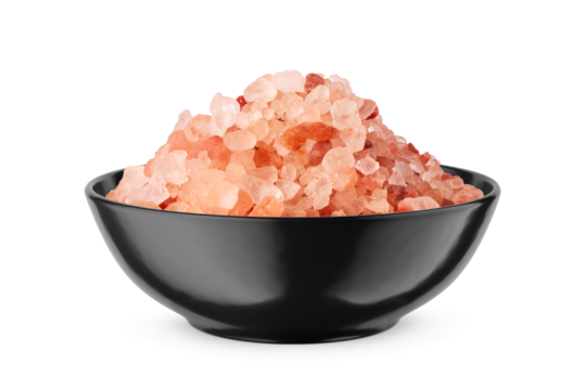 Himalayan coarse salt in black bowl isolated on white. Front view.