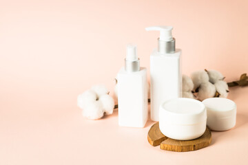 Natural cosmetic product. Spa background. Scincare product - gel, tonic, soap and cream at pastel background.