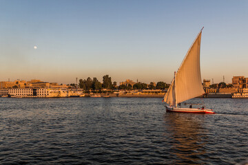 Evening view of felucca sail boat at the river Nile in Luxor, Egypt