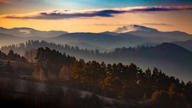The misty landscape of snowy mountain Smerek, one of the peaks of Połonina Wetlińska in West Carpathian Mountains, Bieszczady, Poland