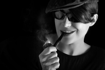 Monochrome woman smoking pipe