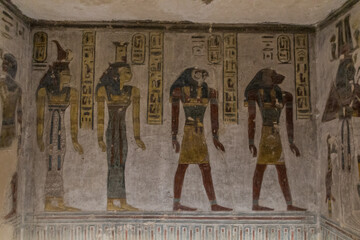 LUXOR, EGYPT - FEB 20, 2019: Decorations of the Ramesses III tomb at the Valley of the Kings at the Theban Necropolis, Egypt - obrazy, fototapety, plakaty