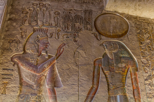 LUXOR, EGYPT - FEB 20, 2019: The pharaoh is welcomed to the afterlife by the god Horus. Ramesses III tomb at the Valley of the Kings at the Theban Necropolis, Egypt