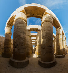 Decorated columns of the Great Hypostyle Hall in the Amun Temple enclosure in Karnak, Egypt