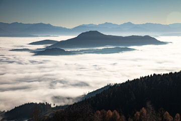 Afternoon view from St.Lorenzen over the valleys of carinthia towards the karawanken mountain range.