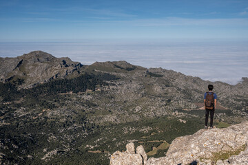 a lone hiker looking up a mountain, Escorca, Mallorca, Balearic Islands, Spain