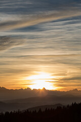 Sunset seen from Lorenziberg over the carithian valleys towards the karawanken mountain range on the austrian and Slovenian border.