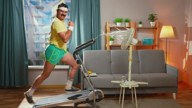 funny athlete with a mustache running treadmill in the living room
