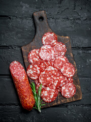 Sliced salami on the Board.