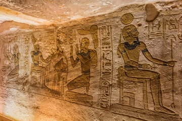 ABU SIMBEL, EGYPT - FEB 22, 2019: Wall carvings in the Great Temple of Ramesses II  in Abu Simbel,...