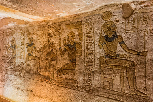 ABU SIMBEL, EGYPT - FEB 22, 2019: Wall carvings in the Great Temple of Ramesses II  in Abu Simbel, Egypt.