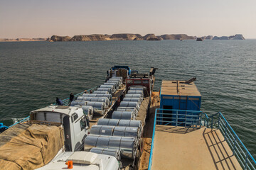 Fototapeta na wymiar Trucks on a ferry crossing Lake Nasser, Egypt