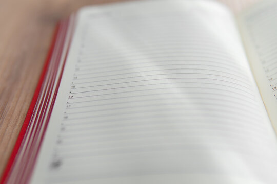 close up of notebook with a blurred background in the foreground