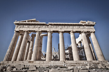 Parthenon under clear blue sky, the famous ancient Greek temple on the acropolis of Athens. Cultural travel Greece.