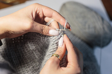 Close-up knitting woman hands