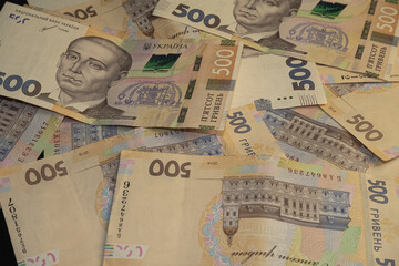 Ukrainian hryvnia, new 500 hryvnia banknotes. hryvnia devaluation. Close-up. Financial background. Hryvnia (UAH)	
