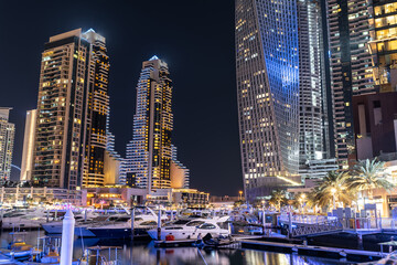 Dubai Marina bay cityscape skyscrapers UAE business district tower modern architecture long exposure lights night sky 