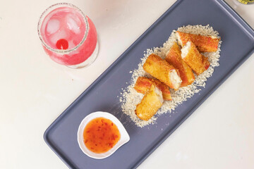 Chesse Kani on a plate and drink, japanese food