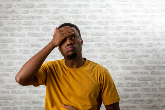 Young Black Man Hold His Head In Hand Forgotten Something