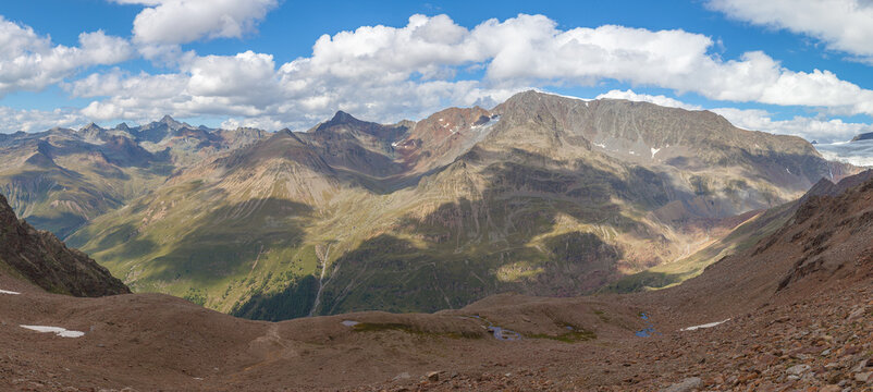Boundless aerial panorama of peaks around Punta del Lago Bianco, in the upper parto of Vallelunga. Alto Adige - Sudtirol, Italy. Popular travel destination