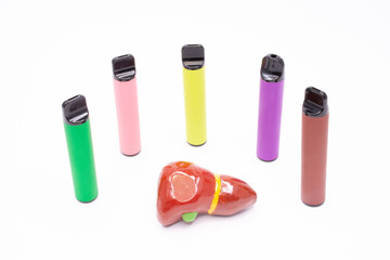 Electronic cigarettes stand around liver with gallblader, showing the destructive effect on human digestive system and liver laboratory indicators. For use in advertising, presentations, scientific 