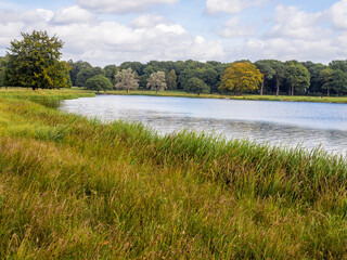 Early Autumn Sunshine on Tatton Park Lake, Knustford, Cheshire, UK