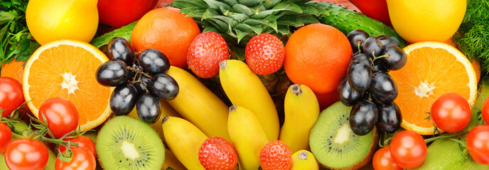 Background of vegetables and fruits. Wide photo.