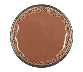Chocolate milk puddle in glass isolated on white, top view