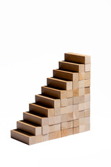 Geometric figure made of wooden bars on a white background