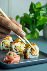 Sushi roll and Chopsticks