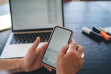 Anonymous person messaging on mobile phone blank screen