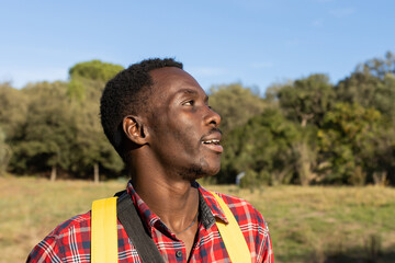 Close-up of African man on vacation in nature.