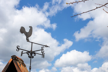 A weather vane, wind vane, or weathercock is an instrument used for showing the direction of the wind. It is typically used as an architectural ornament to the highest point of a building.