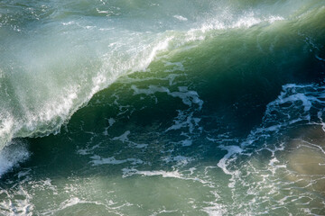 A breaking wave on a sunny day