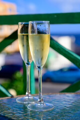Dinner party, drinking of cava or champagne sparkling wine in vacation resort Caleta Fuste, Fuerteventura, Canary islands vacation, Spain