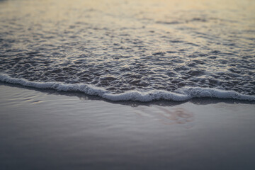 sea waves on the beach. the concept of loneliness. clean sea sand and ocean waves