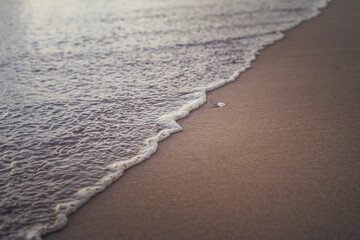 sea waves on the beach. the concept of loneliness. clean sea sand and ocean waves
